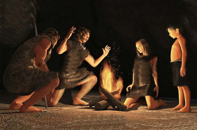 Illustrated image of Cavemen gathered around a fire